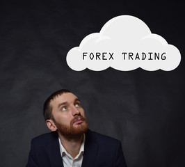 Above the businessman hangs a cloud with the inscription:FOREX TRADING