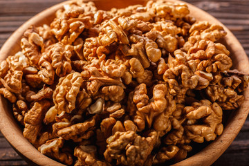 Walnut on a dark rustic wooden background