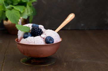Berry ice cream with blackberries and blueberries.