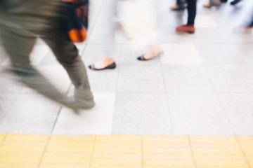 Fototapeta premium Blurred people in train station movement rush hour