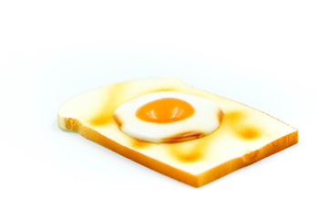 Toast bread with egg on white background.