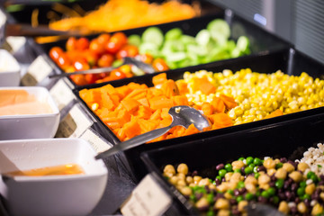Colourful vegetable fresh salad with sauces