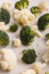 cauliflower and broccoli on a rustic background