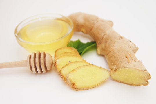 Honey, Ginger and ginger slices. Wooden Spoon for honey. healthy Ingredinet for Tea or Winter.