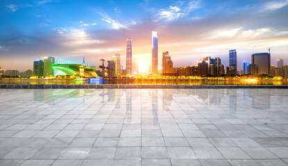 Panoramic skyline and buildings with empty concrete square floor,guangzhou,china
