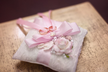 Wedding rings on a pillow