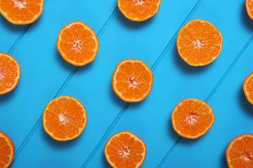 Tangerine on wood table.