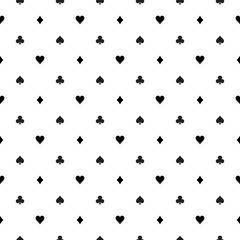 Seamless pattern background of poker suits - hearts, clubs, spades and diamonds - arranged in the rows on white background. Casino gambling theme vector illustration.