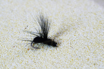 Artificial fly for fishing for trout and other predators 


