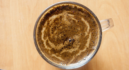 coffee in a glass on the table. View from above