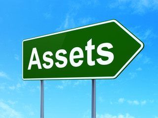 Currency concept: Assets on green road highway sign, clear blue sky background, 3D rendering