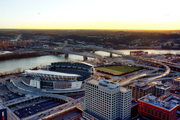 Aerial view of Cincinnati, Ohio looking south across the Ohio river into Covington, Kentucky at sunset.