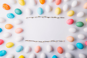 Eggs flat lay on a white background. Easter and spring composition.