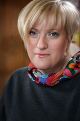 Portrait of a blonde woman with a fashionable haircut
