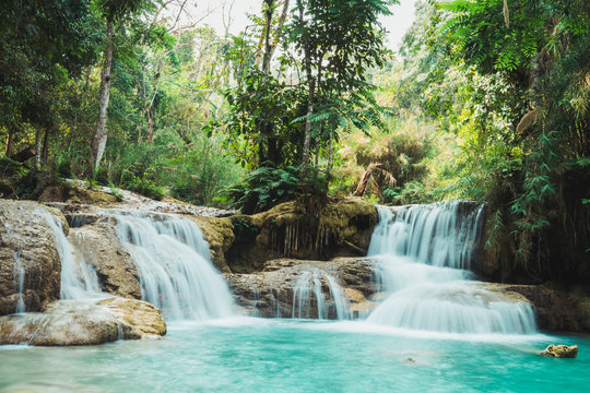 Fototapeta Beautiful small waterfalls flowing