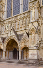 Fototapeta na wymiar Salisbury Cathedral facade detail with statues Wiltshire South West England UK