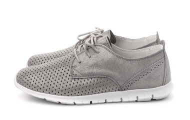 Side view of grey leather sport shoes
