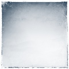 Vintage squared fabric texture background with worn borders.