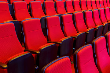 Rows of bright red seats in the cinema