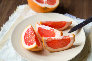 slices of juicy grapefruit on a plate