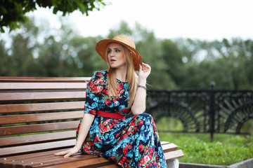 Fototapeta premium Girl in the street with an umbrella