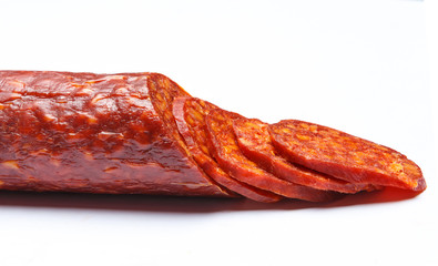 Spanish chorizo sausage on white background