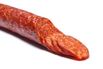 Spanish chorizo sausage on white background