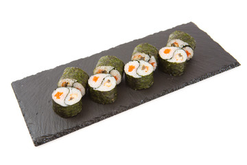 Japanese seafood sushi, roll on shale food board on white background