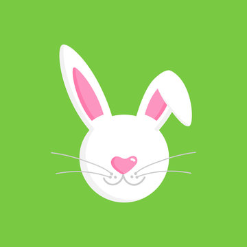 Cute white easter bunny head with ears, muzzle and whiskers, vector graphic illustration isolated on green background.