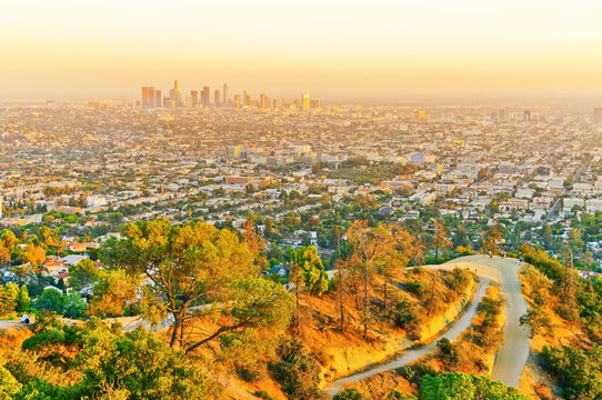 View of Hollywood Hill and city center of Los Angeles at sunset.