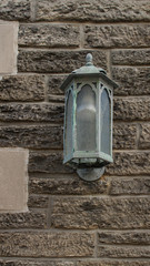 Lamp on the  the stone wall