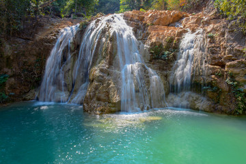 Fototapeta na wymiar Close-up beautiful green waterfalls. Copy space.