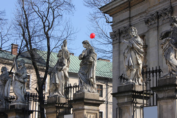 Statues in front of Saints Peter and Paul Church in Kraków, Poland
