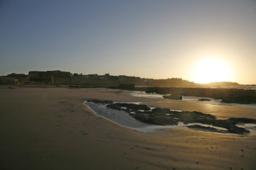 Battlements of the city of Essaouira at sunset  , Morroco
