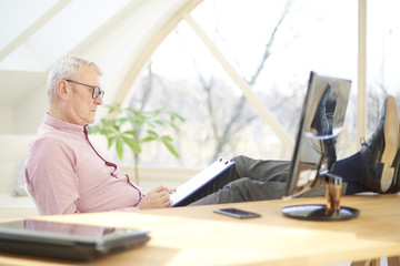 Executive senior businessman working at the office