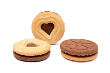 Chocolate heart in round biscuit isolated on white background