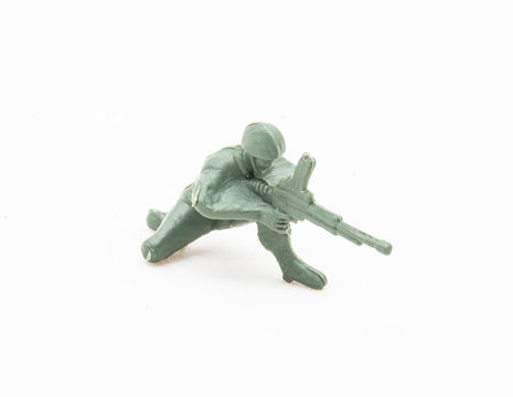 Plastic toy soldier with machine gun