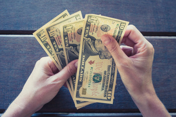 female hands counting ten dollar bills - cash money USD - obrazy, fototapety, plakaty