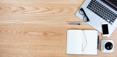 Clean red oak desktop with coffee for business or education background