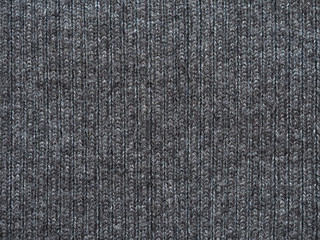 Texture fabric wool, knitted gray pattern close-up. Knitwear, background of oxford gray woolen