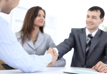 Fototapeta premium handshake business partners in the workplace