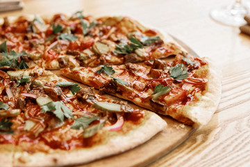 Meat pizza with hot bbq sauce, toned