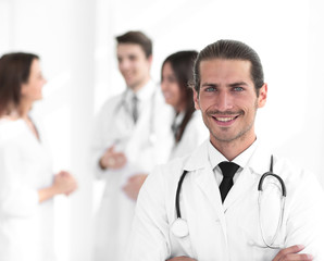 Fototapeta premium smiling doctor therapist on blurred background.