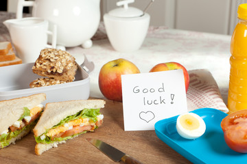 Breakfast table with good luck note