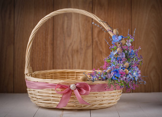 Fototapeta na wymiar basket on a wooden background