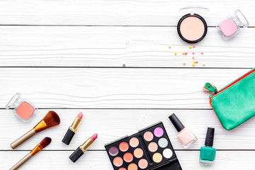 Obraz na płótnie Canvas Decorative cosmetics for make up on white desk background top view mockup