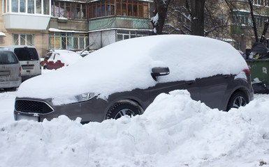 Car covered with snow