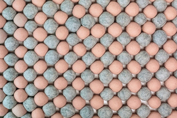Background of merino wool balls.A lot of pink and gray balls.
