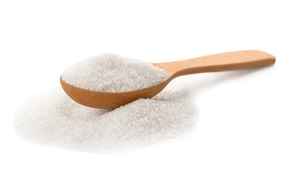 Wooden spoon with pure sugar on white background