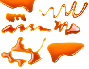 Caramel pieces and sauce collection isolated on white background